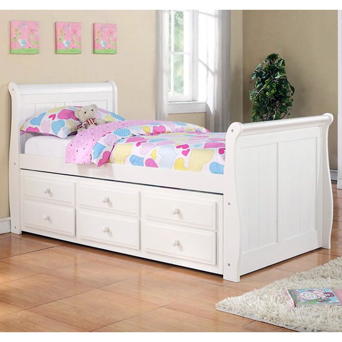 white twin bed with trundle and storage
