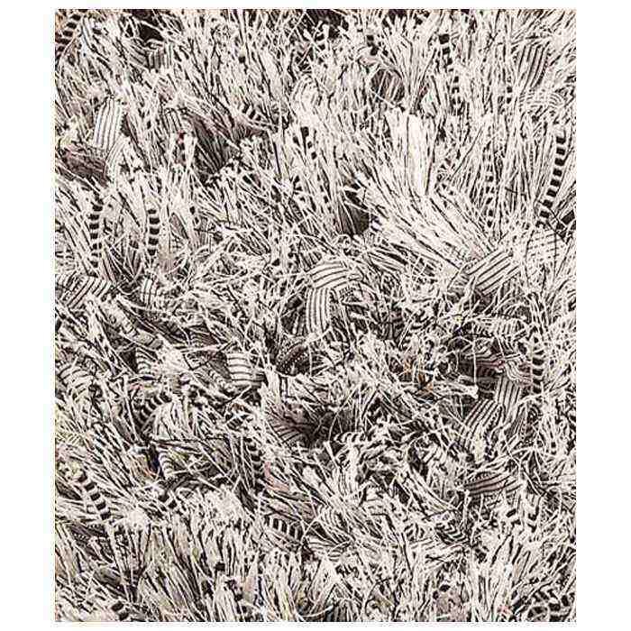 Lucetta Hand Woven Polyester Shaggy Rug in Silver 